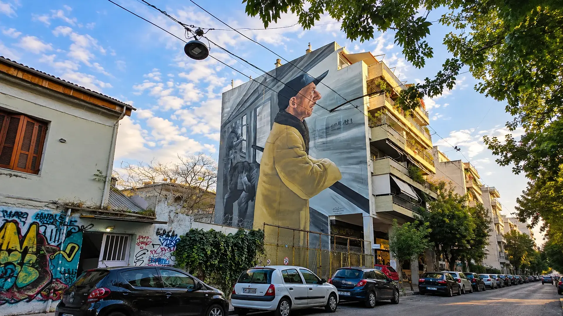 Large-scale portrait mural on an urban building, illustrating how OOH advertising strategy can transform public spaces into cultural touchpoints