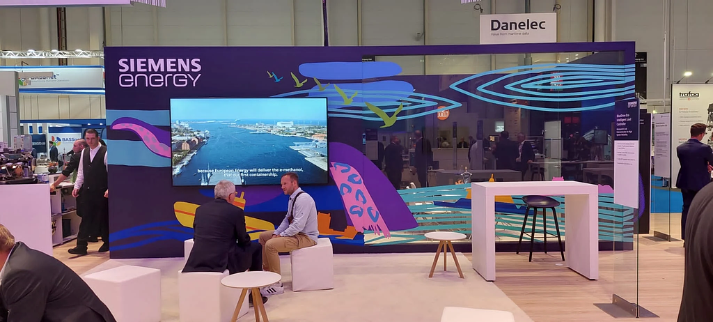 Completed tape art design by TAPE OVER on the Siemens Energy booth at SMM Hamburg 2024